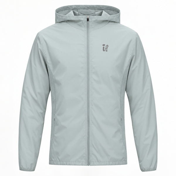 A light grey hooded ideal apparel windbreaker jacket with a full front zipper and a small gray stylized logo on the left chest, displayed on a clean white background.